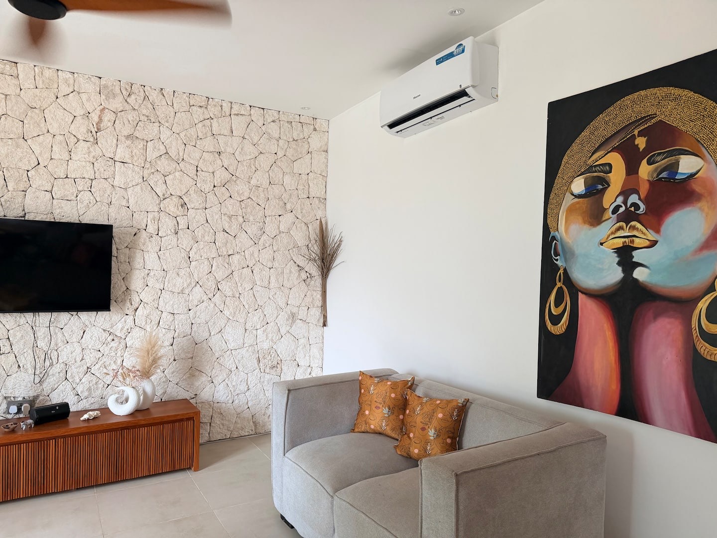 Living space with coral-stone wall