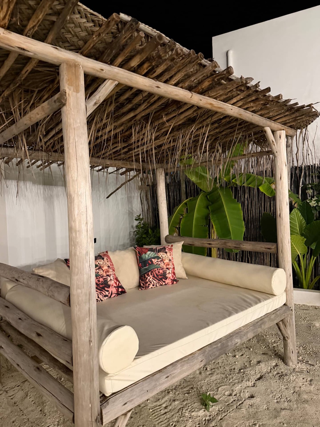 Outdoor daybed under a pergola